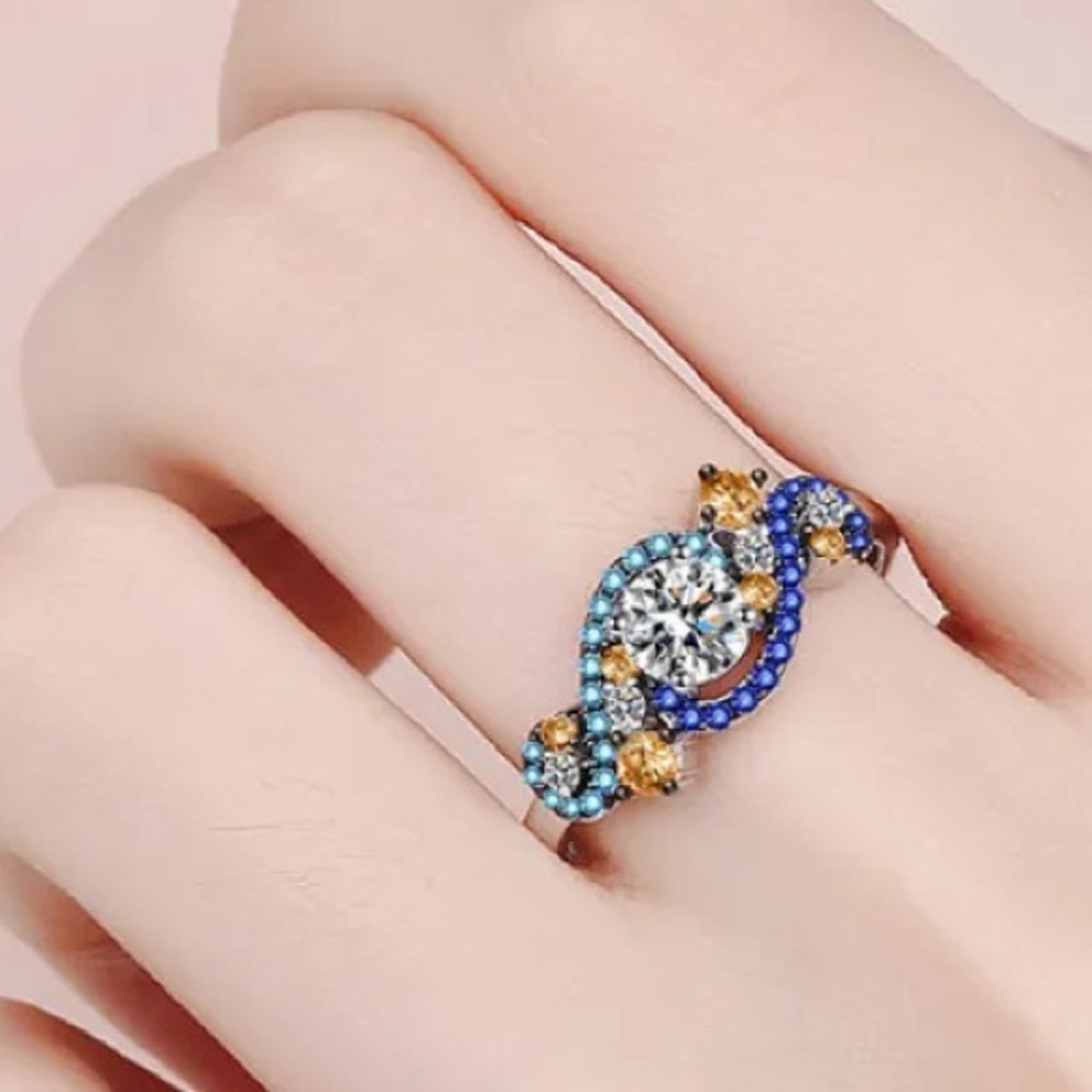 Moissanite Infinity Style Sterling Silver Ring